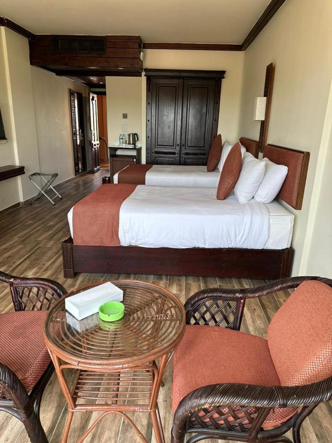 Africana Hotel & Spa Qaryat Shakush Extérieur photo